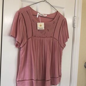 Love this shirt! Beautiful peach color!